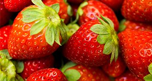 a close up photo of fresh strawberries.